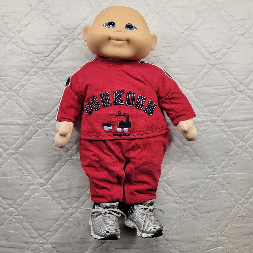 Cabbage Patch Kids boy doll wearing OshKosh red jogging suit